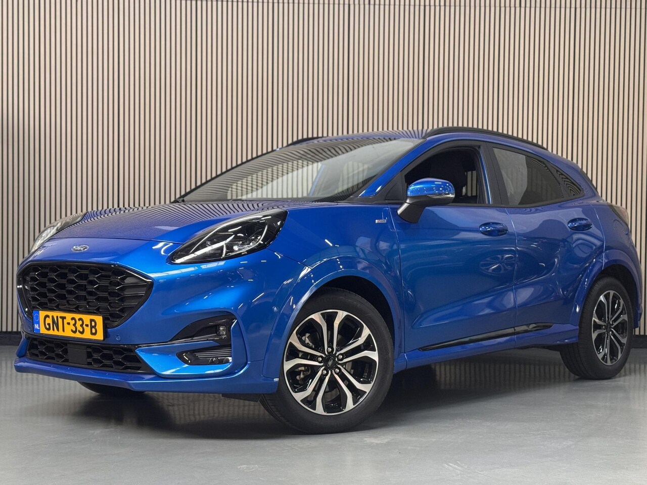 Ford Puma - 125pk ST-Line X Half Leer B&O Navi Camera Parking pack Privacy glass All Season Banden - AutoWereld.nl