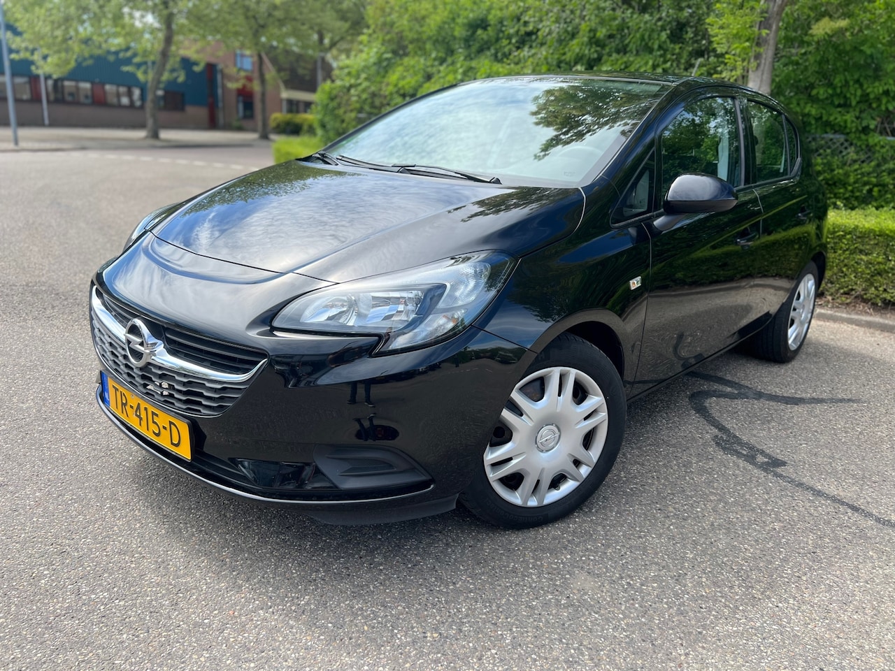 Opel Corsa - 1.4 Favourite Cruise control Airco - AutoWereld.nl