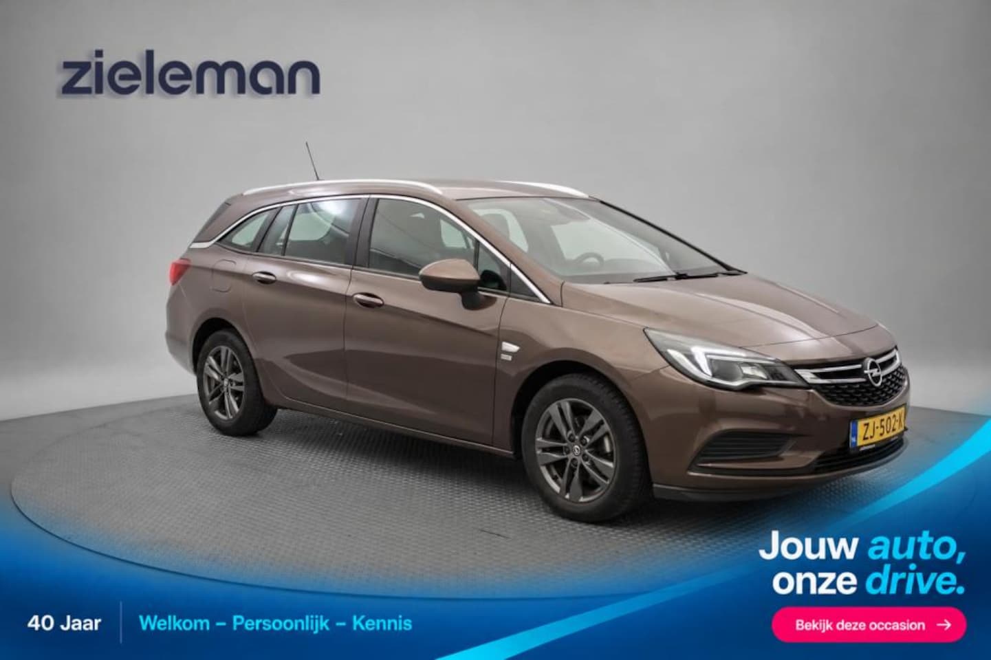 Opel Astra Sports Tourer - 1.0 Turbo 120 Jaar Edition - Carplay, Cruise, Trekhaak - AutoWereld.nl