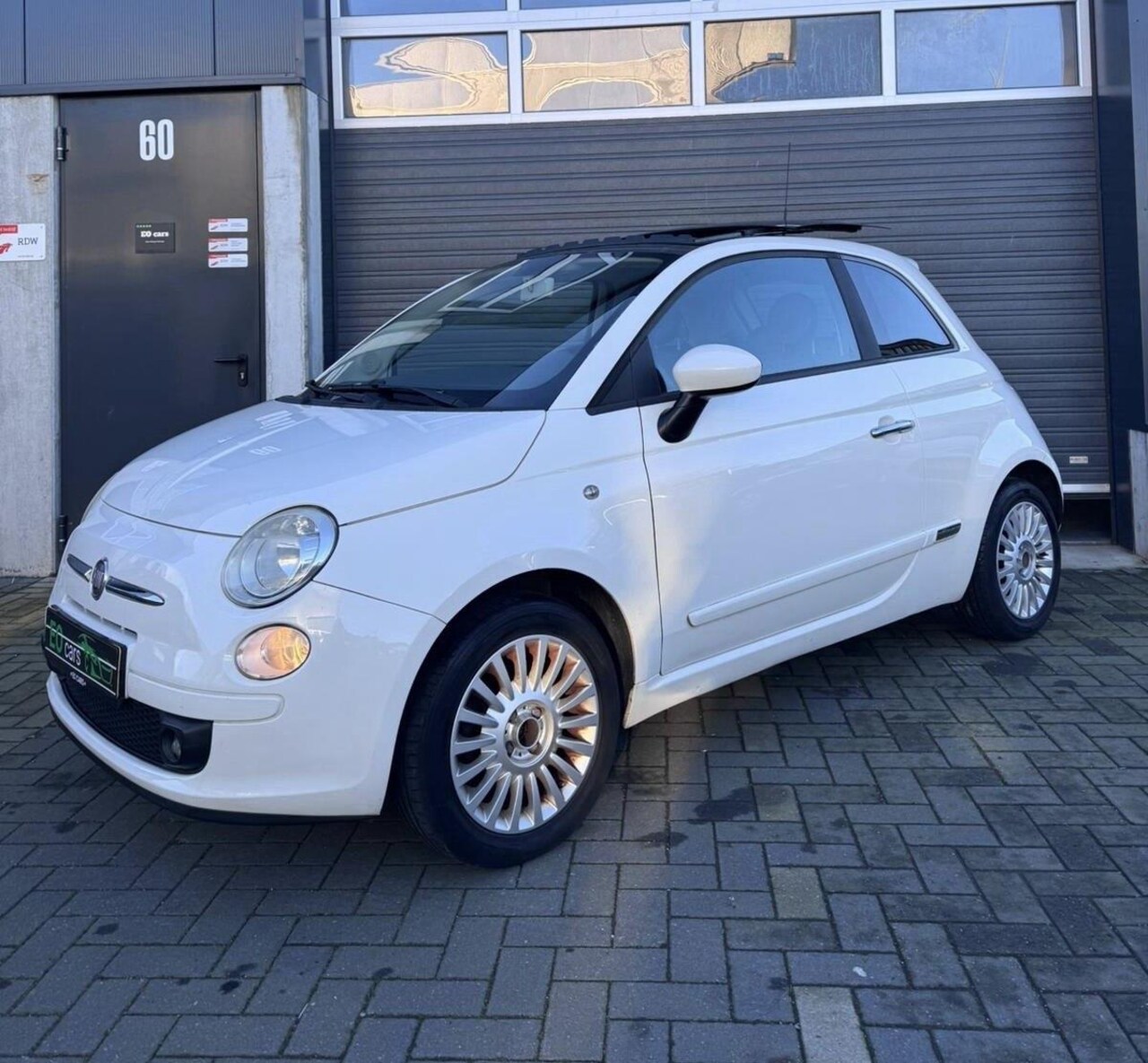 Fiat 500 - 1.2 Naked airco pano wit - AutoWereld.nl
