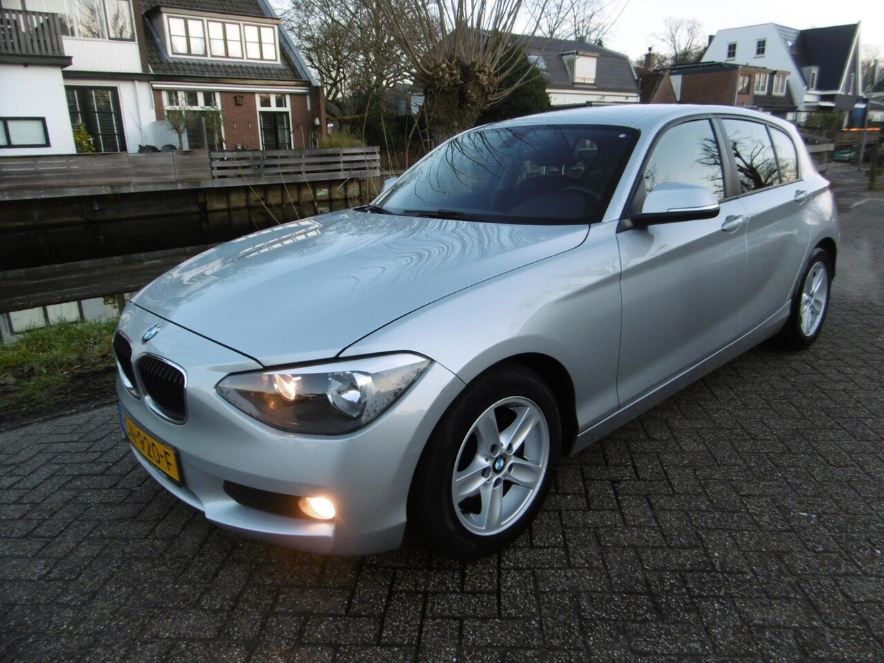 BMW 1-serie - 116i 5-deurs 136pk Airco PDC 2e eigenaar Zuinig A-Label - AutoWereld.nl