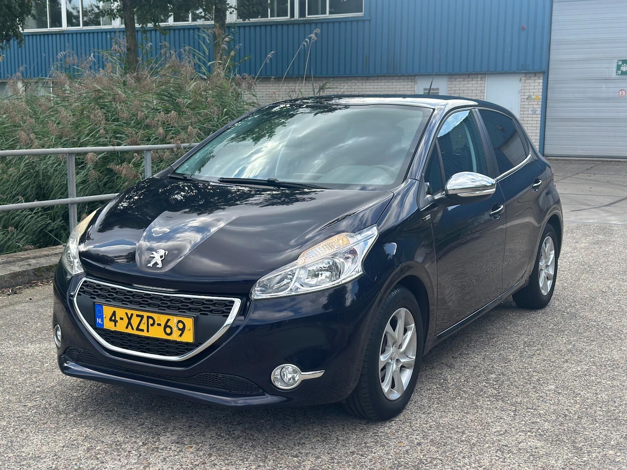 Peugeot 208 - 1.2 PureTech Style!2014! Nieuw distributie 5-deurs!Navi!NAP! 1 jaar APK - AutoWereld.nl
