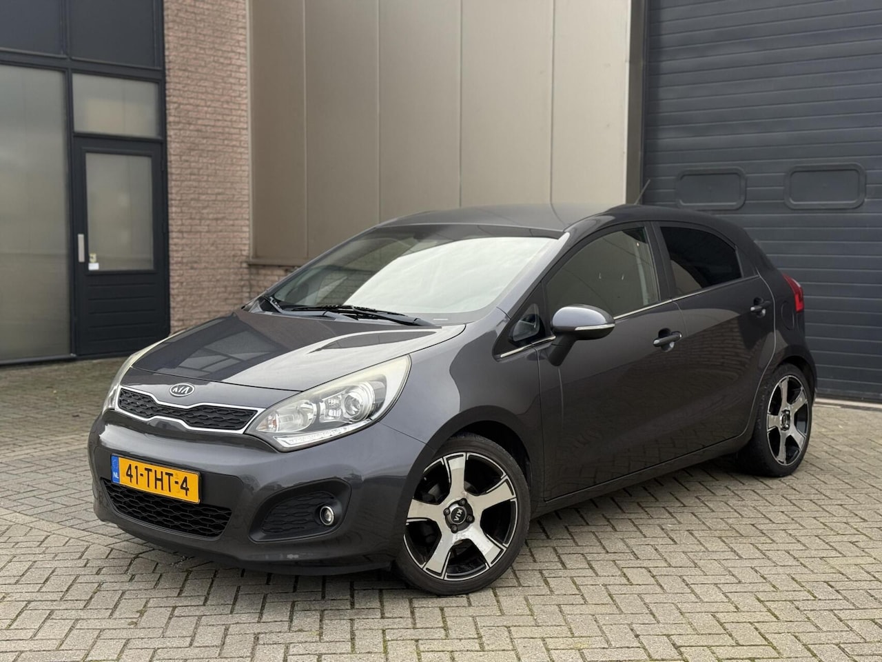 Kia Rio - 1.2 CVVT Super Pack Airco/Cruise/Keyless Set Banden - AutoWereld.nl