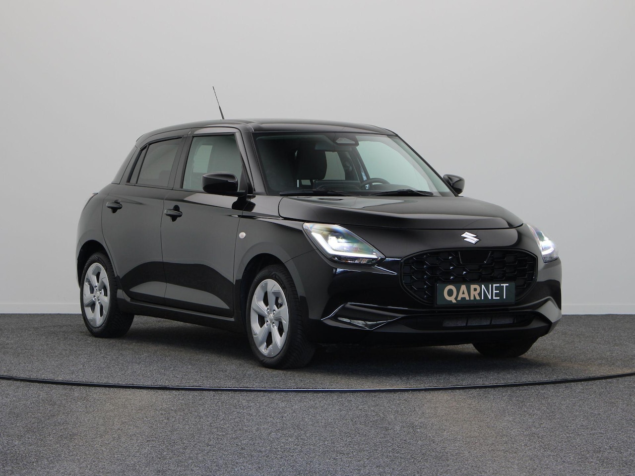 Suzuki Swift - 1.2 Comfort Smart Hybrid | Achteruitrijcamera | Stoelverwarming | Adaptieve cruise control - AutoWereld.nl