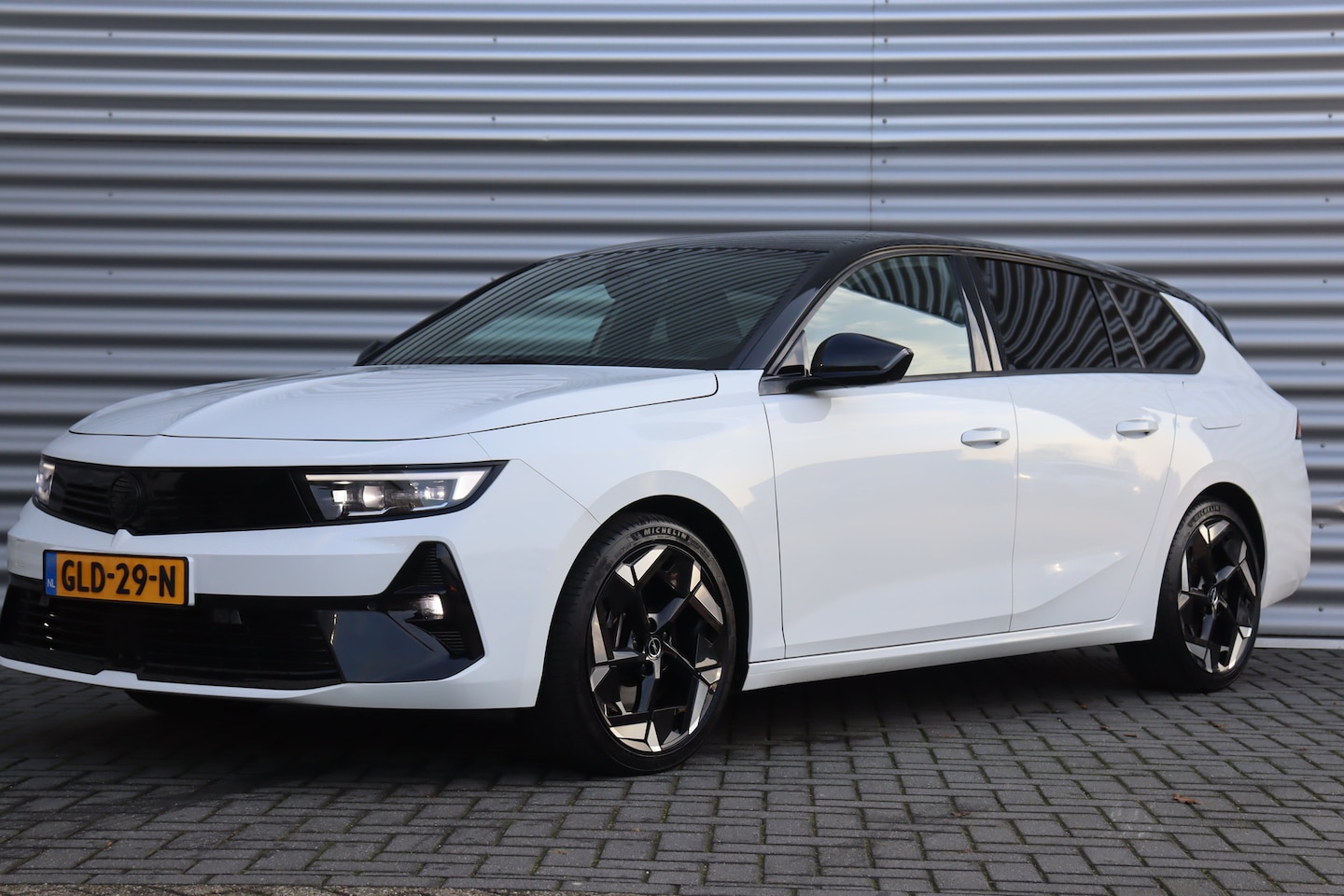 Opel Astra Sports Tourer - 1.6 PLUG IN HYBRID 225PK GSE / NAVI / ALCANTARA / CLIMA / LED / PDC / 18" LMV / CAMERA / H - AutoWereld.nl