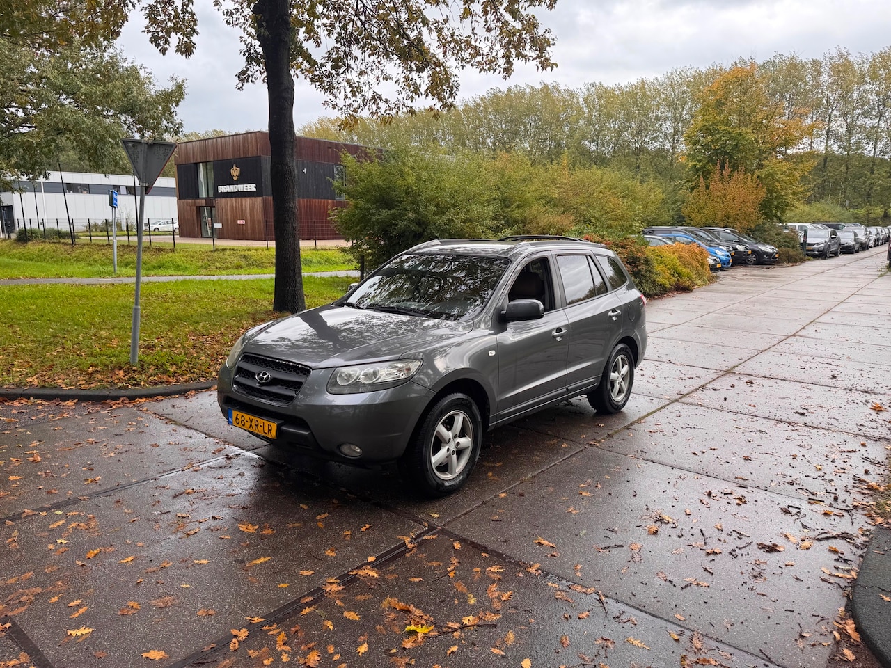 Hyundai Santa Fe - 2.7i V6 Dynamic 7p.Clima.Navi.Leder 7 persoons - AutoWereld.nl