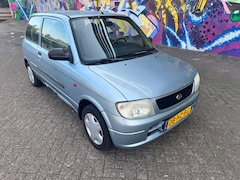 Daihatsu Cuore - 1.0-12V XTi elektrische ramen centrale vergrendeling apk januari 2026 rijd heerlijk boeken