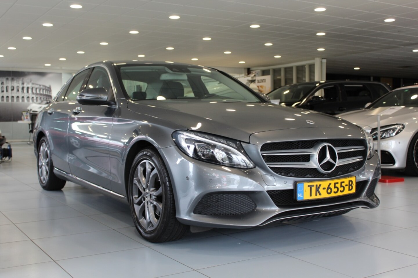 Mercedes-Benz C-klasse - 180 Bus. Sol. AMG/PANORAMADAK/CRUISE/NAVI - AutoWereld.nl