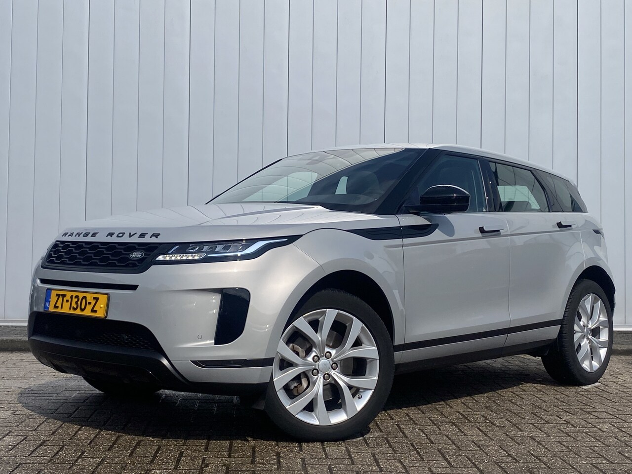 Land Rover Range Rover Evoque - 2.0 P200 AWD R-Dynamic Hello Edition Leder Panorama Meridian NL Auto Carplay Navi - AutoWereld.nl