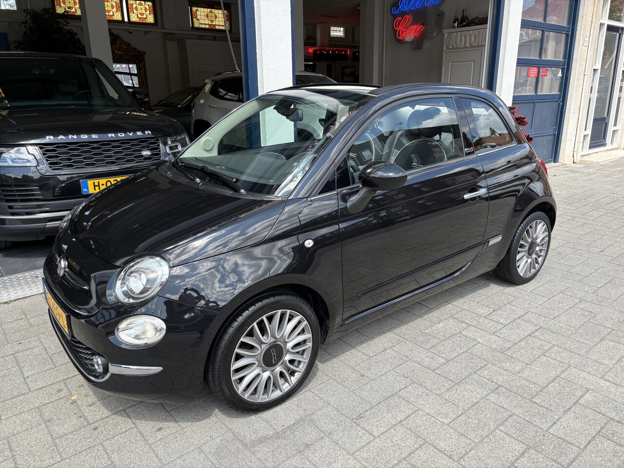 Fiat 500 C - 0.9 TwinAir Turbo Lounge CLIMA/NAVI/CARPLAY/LM VELGEN - AutoWereld.nl