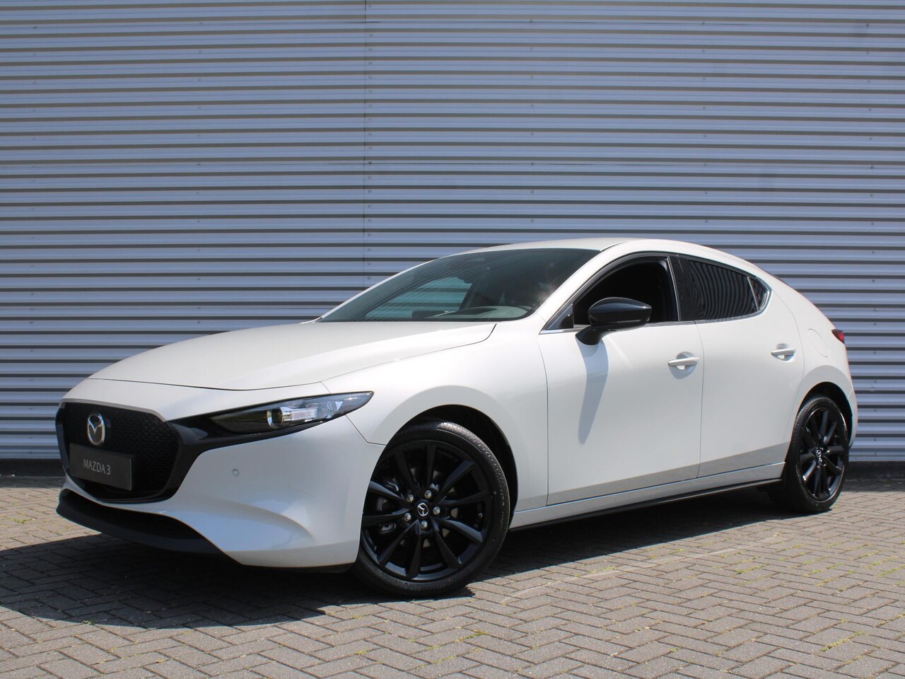 Mazda 3 - 2.0 e-SkyActiv-G M Hybrid 150 Homura | Stoelverwarming | Camera | Dodehoek detectie | HUD - AutoWereld.nl