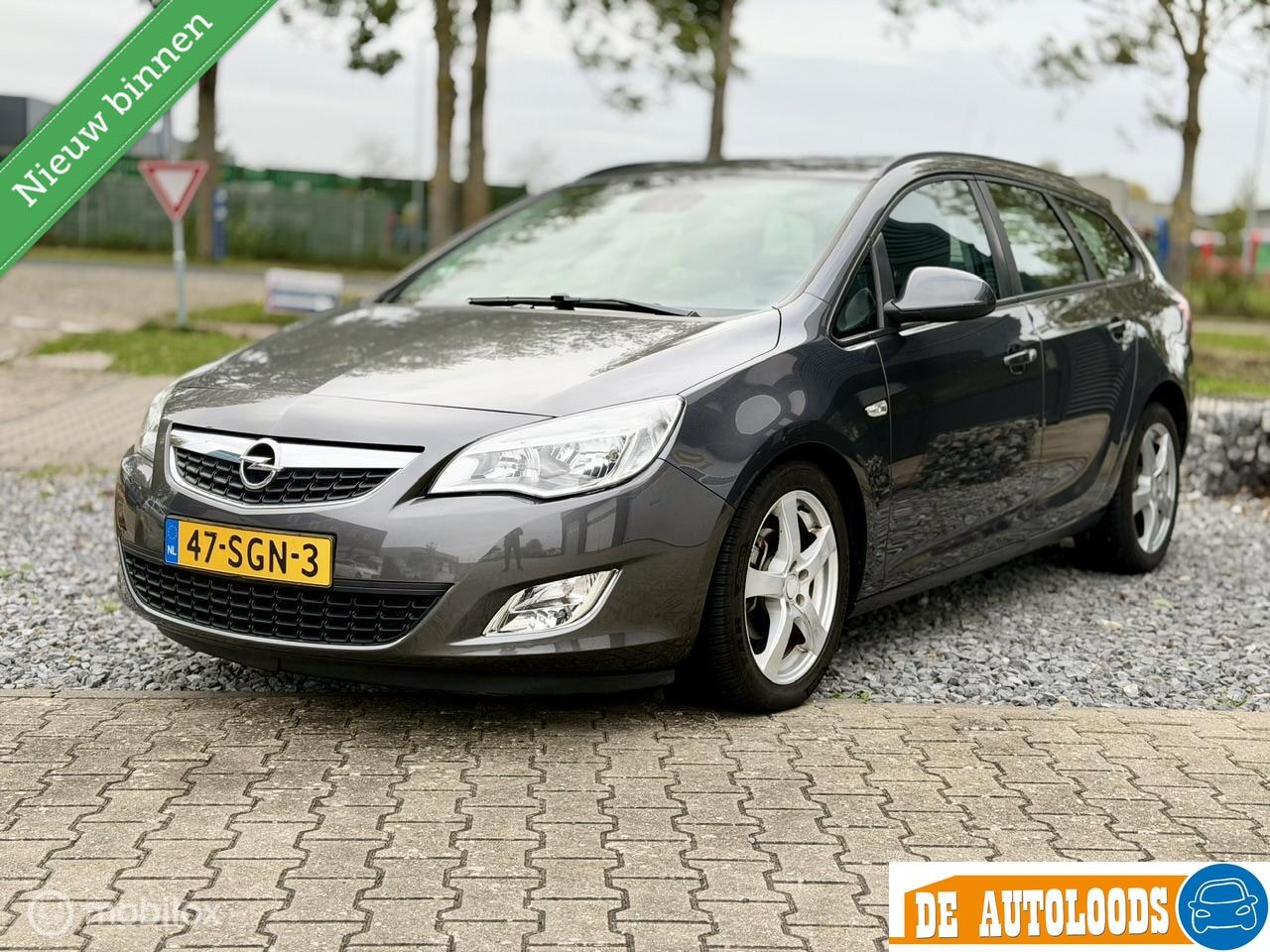 Opel Astra Sports Tourer - 1.4 Turbo | NAP | Airco | Cruise - AutoWereld.nl
