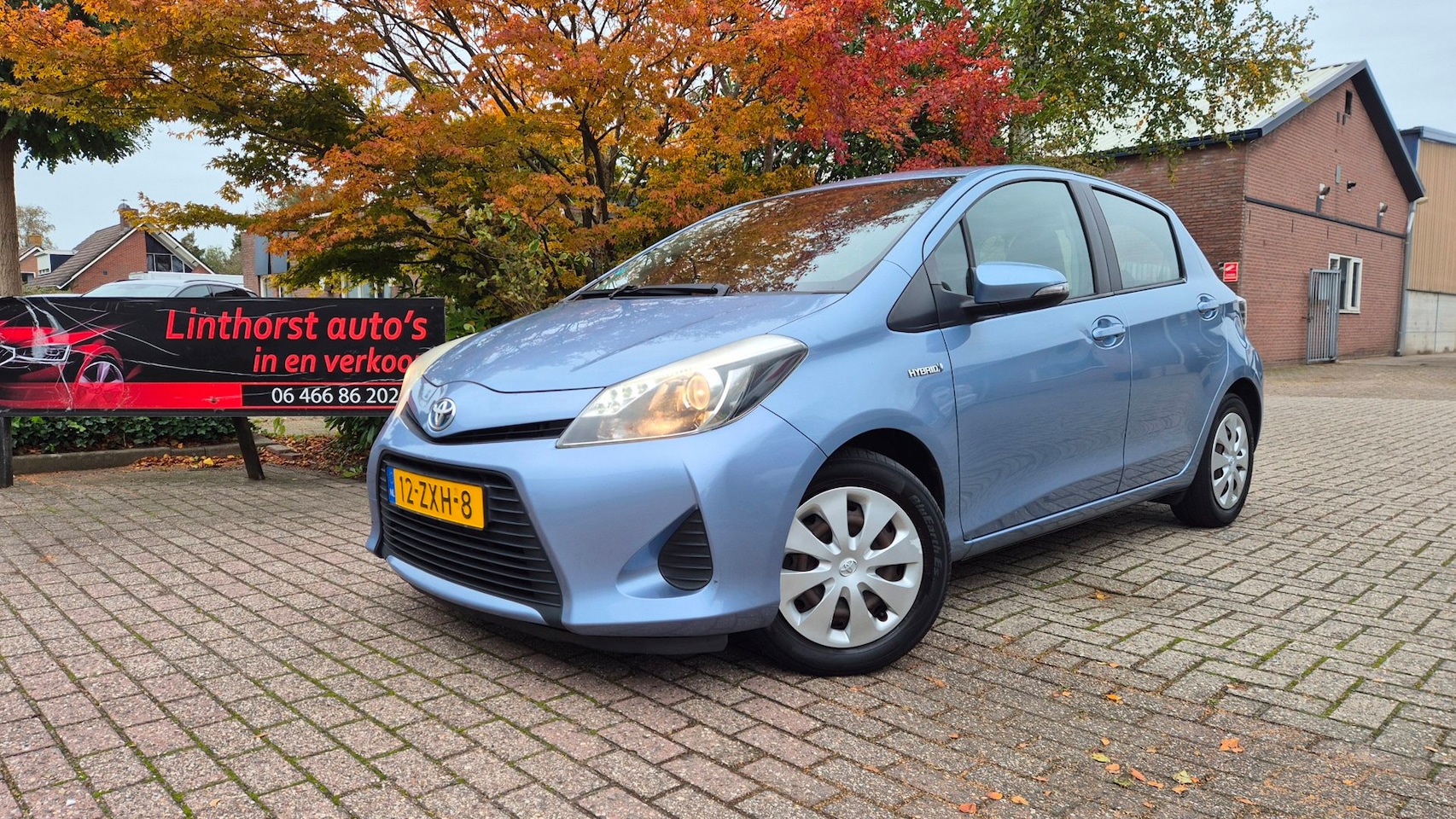 Toyota Yaris - 1.5 Full Hybrid Aspiration-camera-2013 - AutoWereld.nl