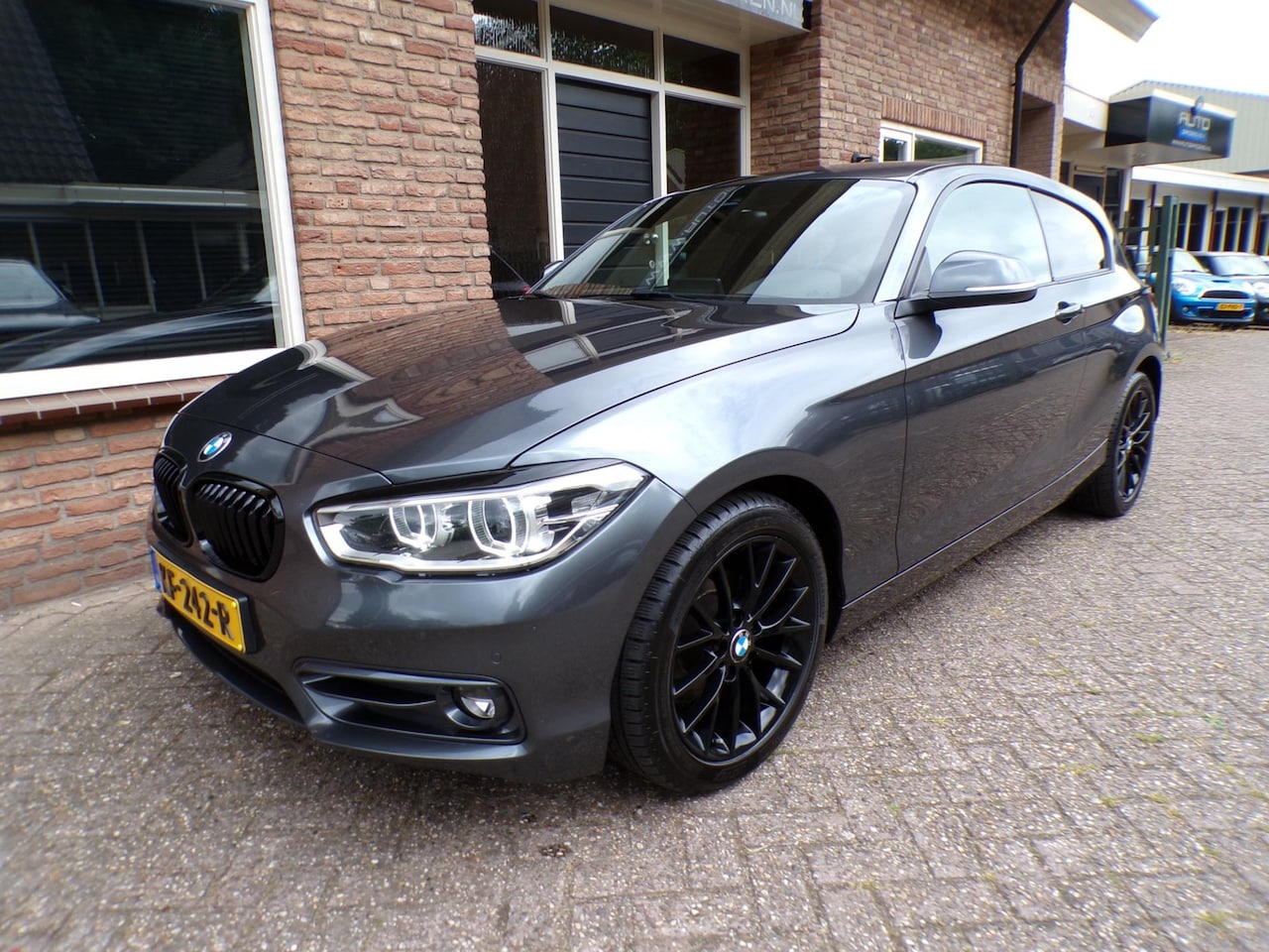 BMW 1-serie - 118i Centennial High Executive Automaat / leder / Navi - AutoWereld.nl