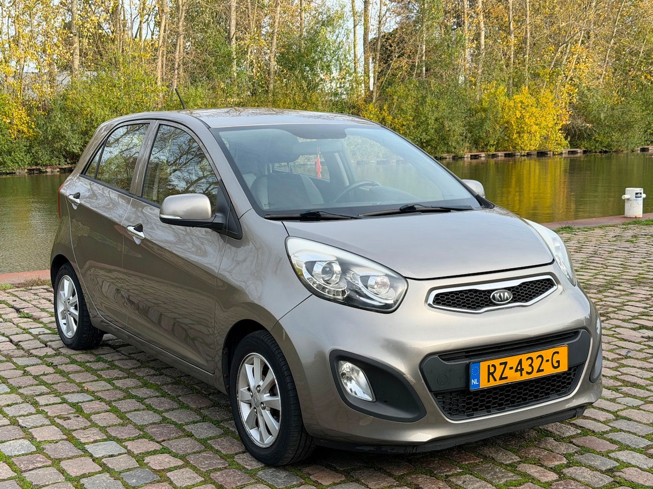 Kia Picanto - 1.0 CVVT Comfort Pack 2e eigenaar airco elektrische ramen parkeersensoren stuurknoppen - AutoWereld.nl
