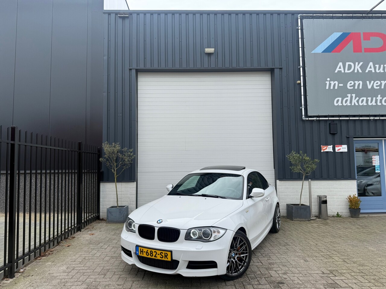 BMW 1-serie Coupé - 135i High Executive SCHUIFDAK/LEDER/XENON/18'/450PK - AutoWereld.nl