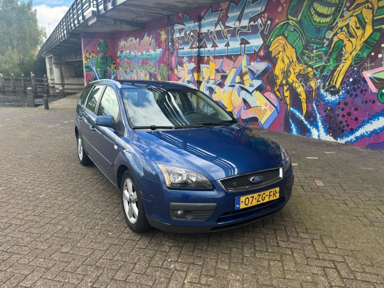 Ford Focus Wagon - 1.8-16V Ambiente Flexifuel airco navigatie sport velgen leuke auto - AutoWereld.nl