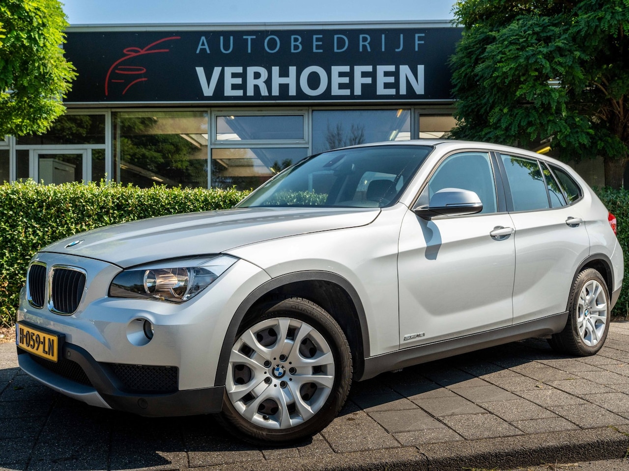 BMW X1 - SDrive18i - AUTOMAAT - NAVIGATIE - TREKHAAK - LEDER - CRUISE / CLIMATE - MEMORY SEATS - PD - AutoWereld.nl