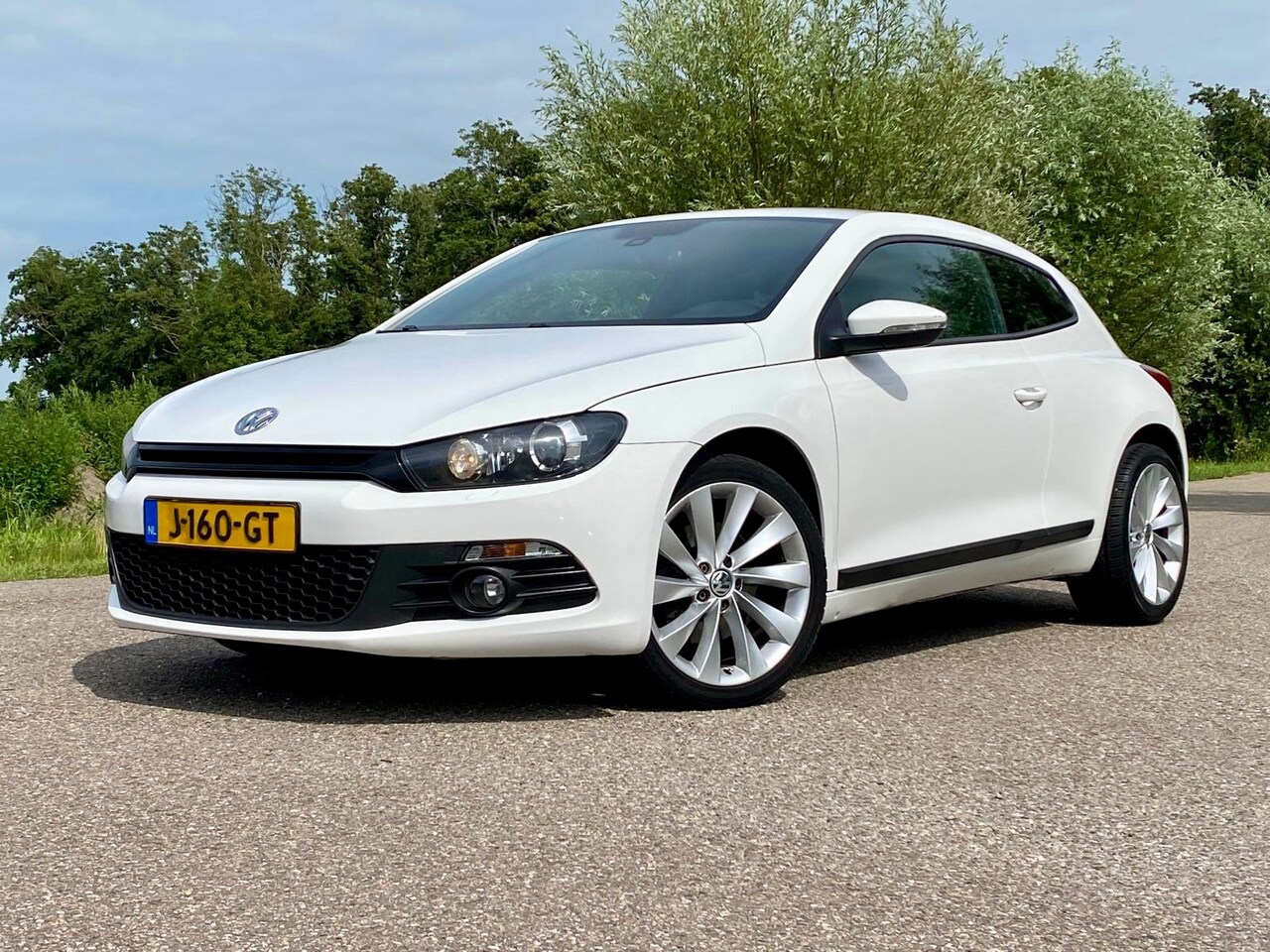 Volkswagen Scirocco - 1.4 TSI Highline Plus Sport Automaat NAVI 161PK GOED ONDERHOUDEN - AutoWereld.nl