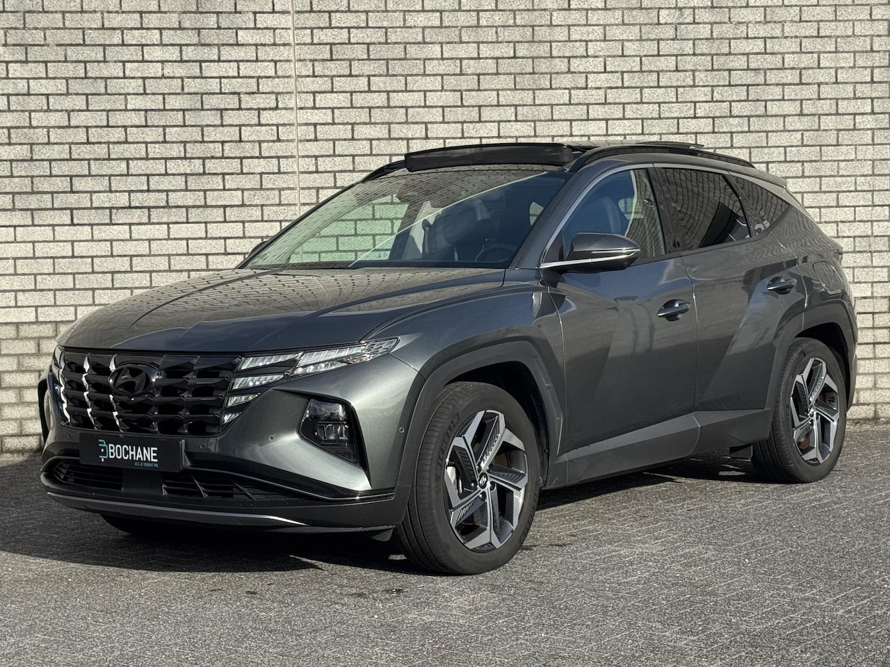 Hyundai Tucson - 1.6 T-GDI PHEV Premium Sky 4WD | SOH 97% | Trekhaak | Panoramadak | 360° Camera | Stoelver - AutoWereld.nl