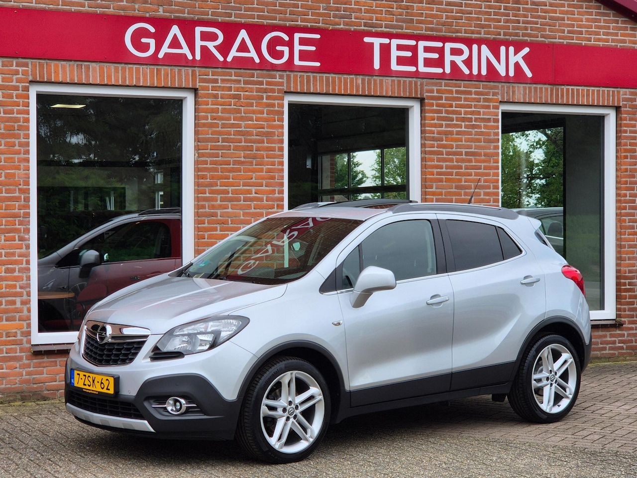 Opel Mokka - 1.4 T Cosmo 140PK 5drs clima, cruise, navi, pdc, camera, agr, leder, trekhaak - AutoWereld.nl