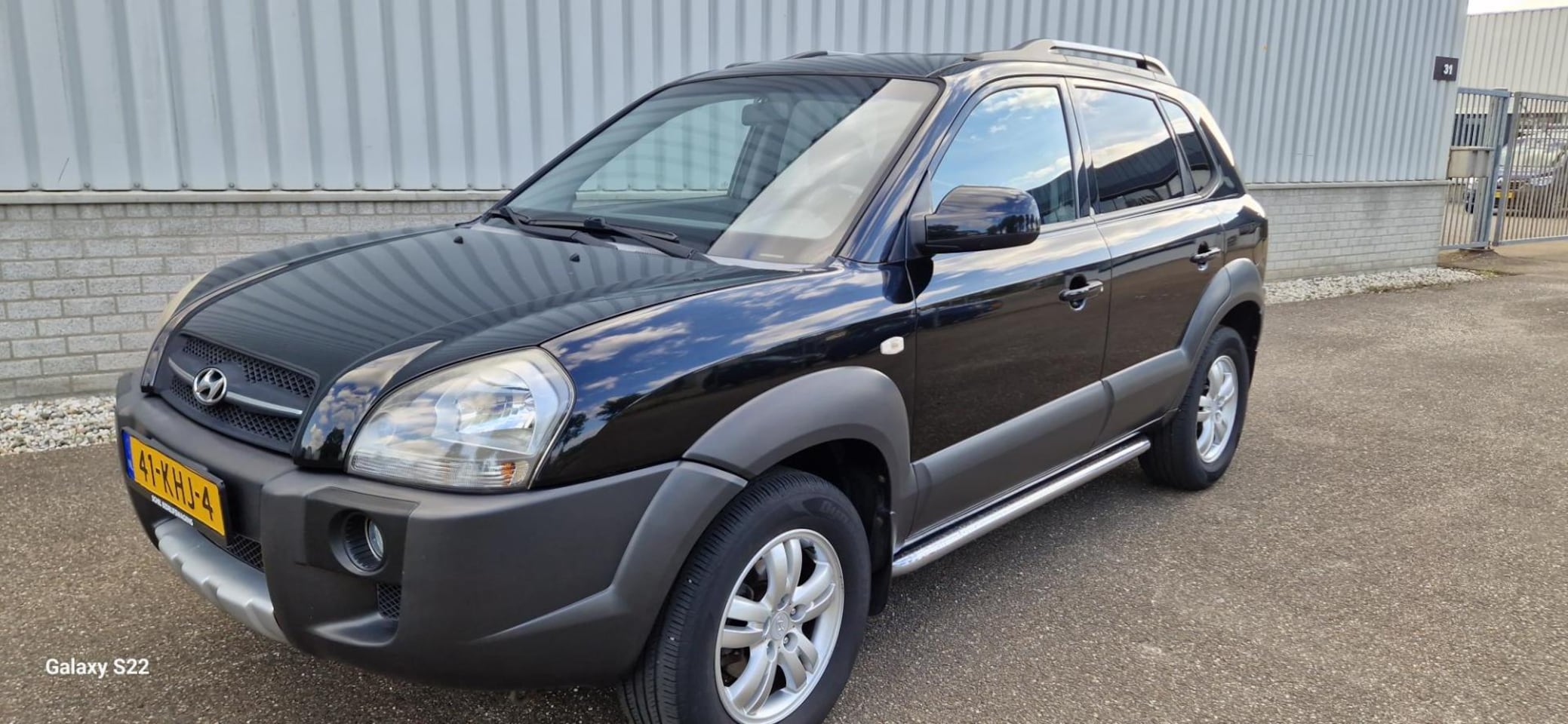 Hyundai Tucson - 2.0i Style Cross 2.0i Style Cross - AutoWereld.nl