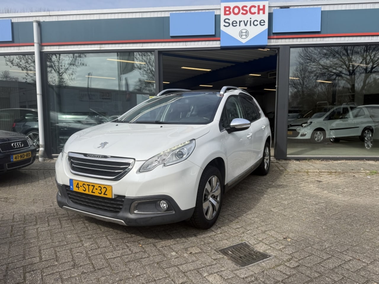 Peugeot 2008 - 1.2 VTi All. Pack Pr - AutoWereld.nl