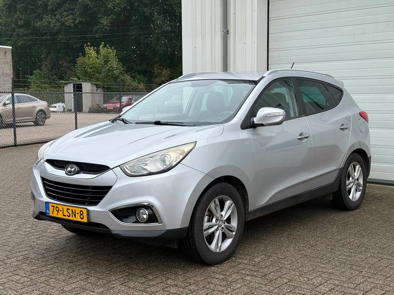 Hyundai ix35 - 2.0i Style 2.0i Style, Camera, Leer, Climate, Cruise, Trekhaak ! - AutoWereld.nl