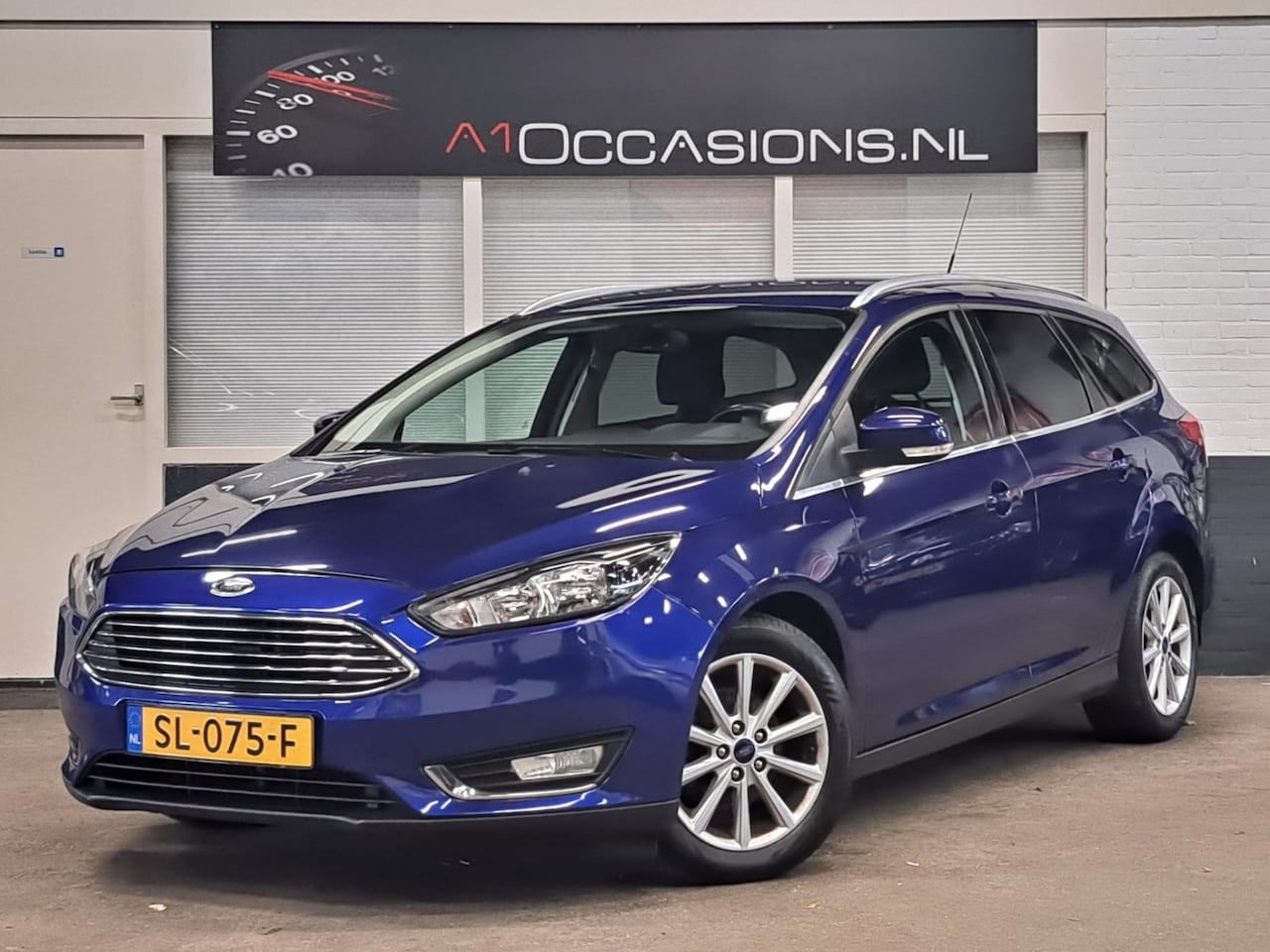 Ford Focus Wagon - 1.0 Titanium + NAVI - AutoWereld.nl