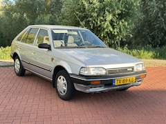 Mazda 323 - 1.3 LX Automaat/Nap
