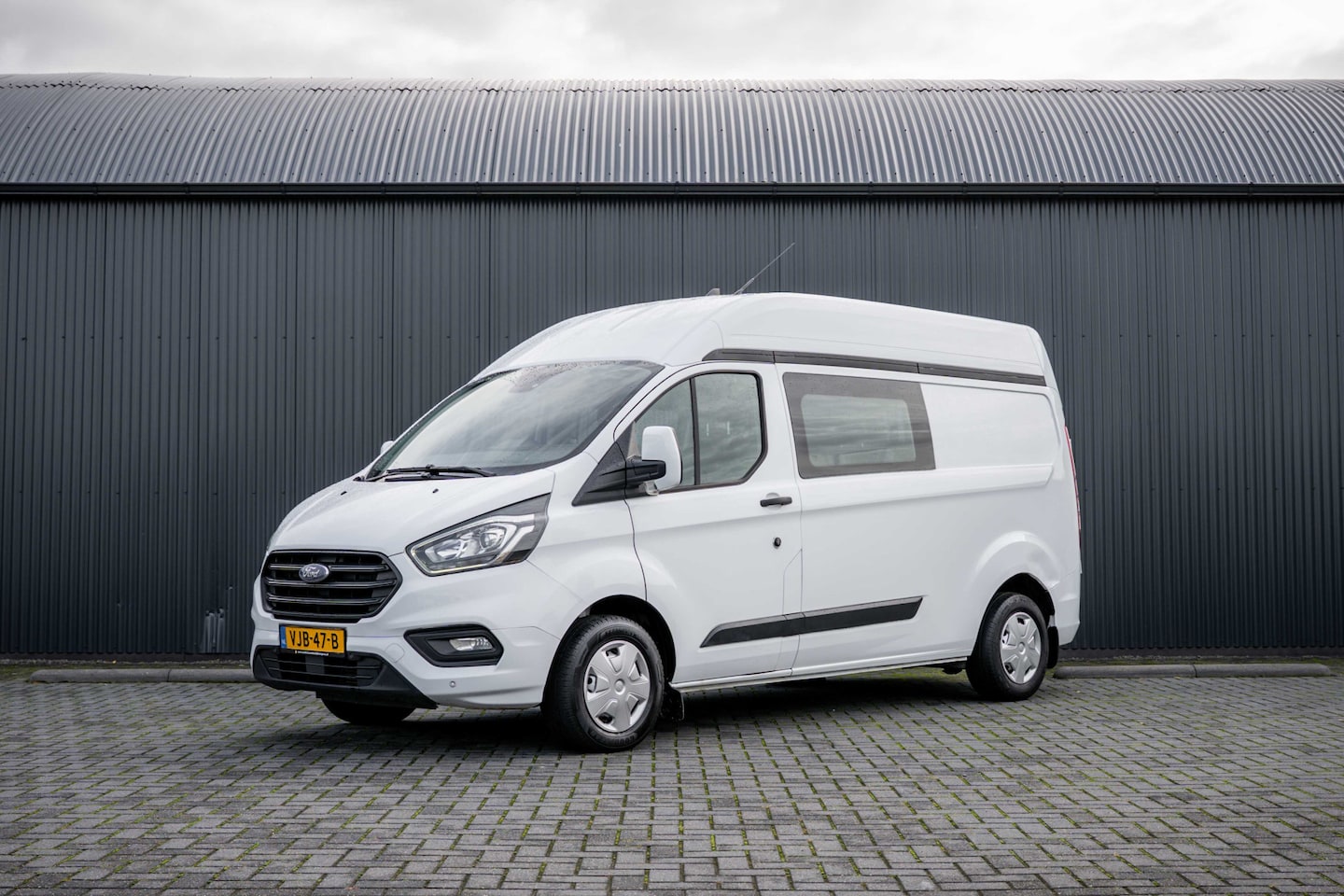 Ford Transit Custom - 2.0 EcoBlue L2H1 | DC 5-Zits | 1e Eigenaar | Cruise | PDC | Stoelverw. | Airco | Trekhaak - AutoWereld.nl
