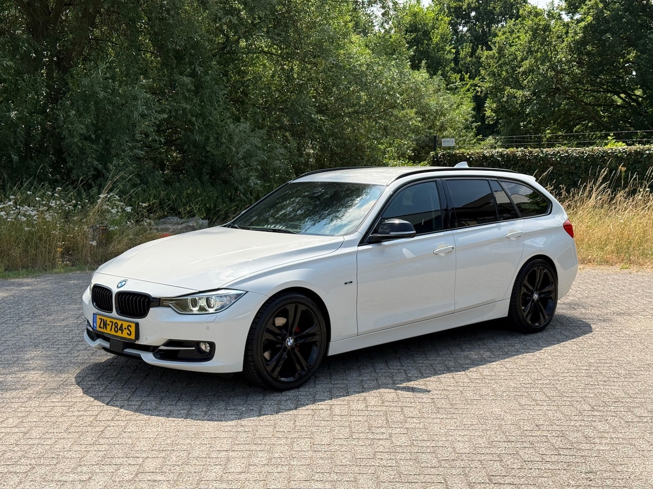 BMW 3-serie Touring - 320i High Executive AUTOMAAT I LED I NAVI I VOLL ONDERHOUD - AutoWereld.nl
