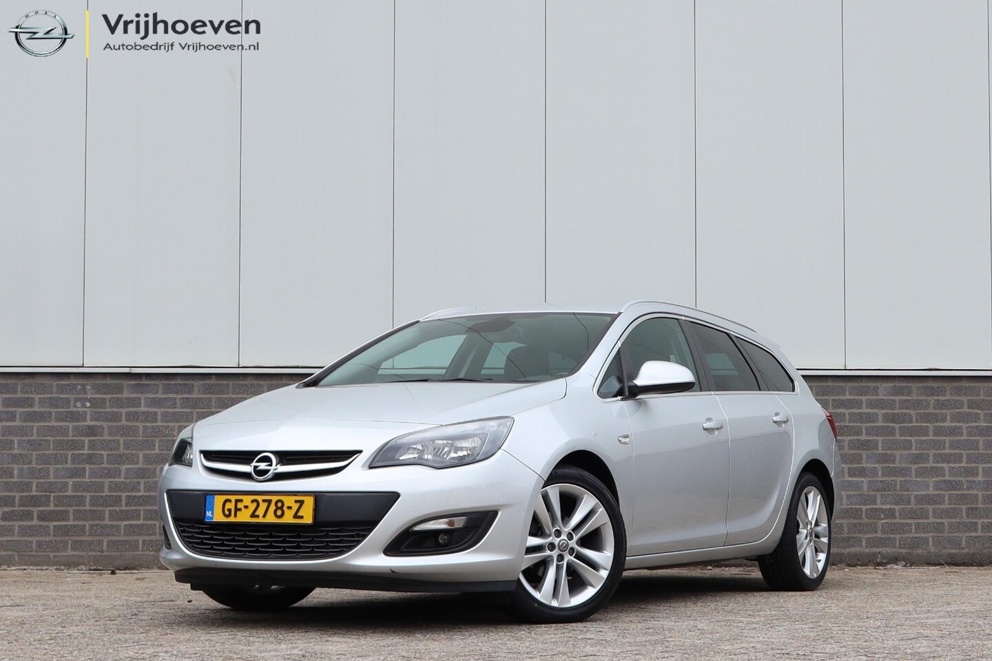 Opel Astra Sports Tourer - 1.4 Turbo Business + Navi Trekhaak 2e eig. - AutoWereld.nl