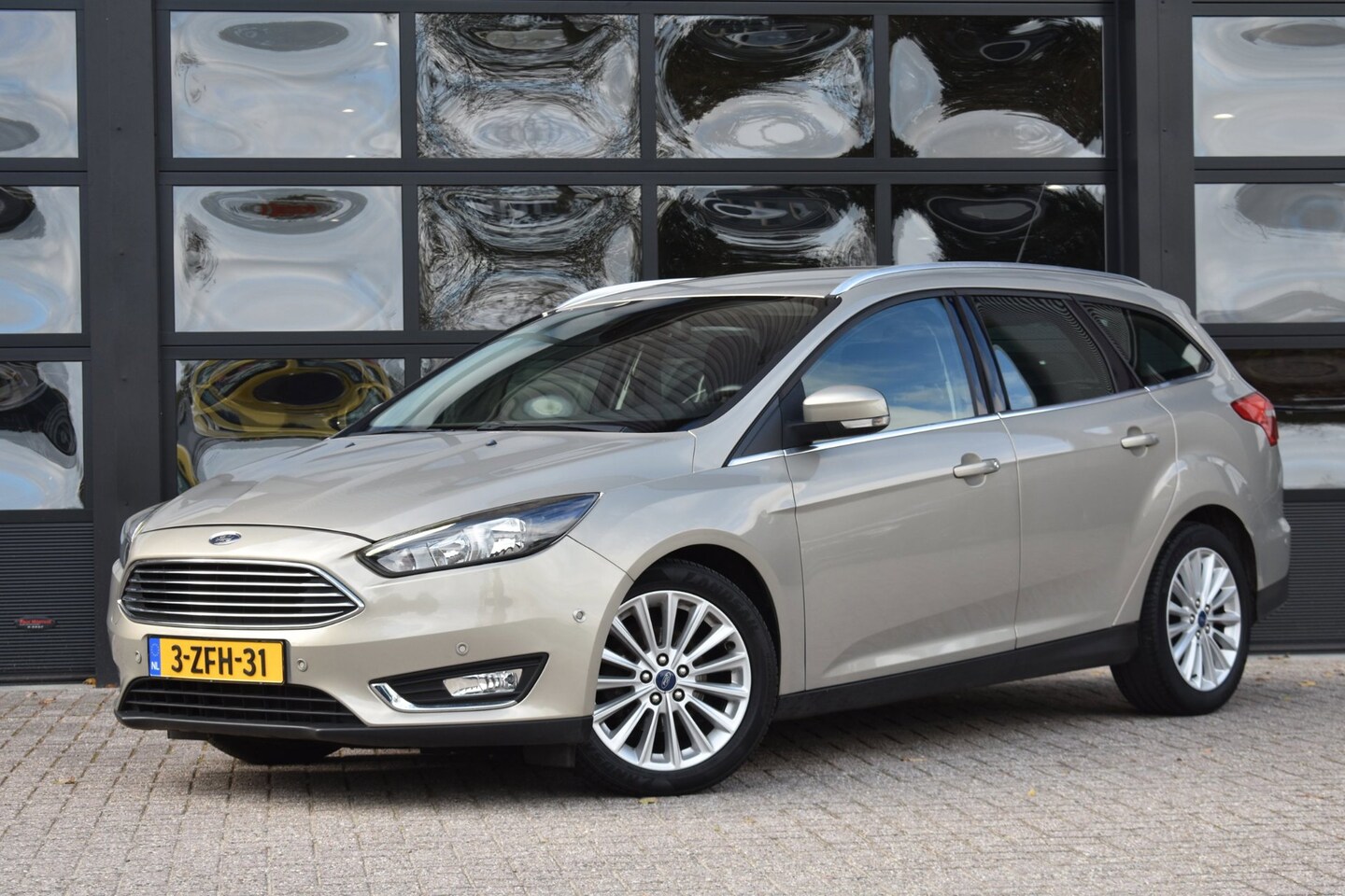 Ford Focus Wagon - 1.0 First Edition '15 Navi Clima Cruise - AutoWereld.nl