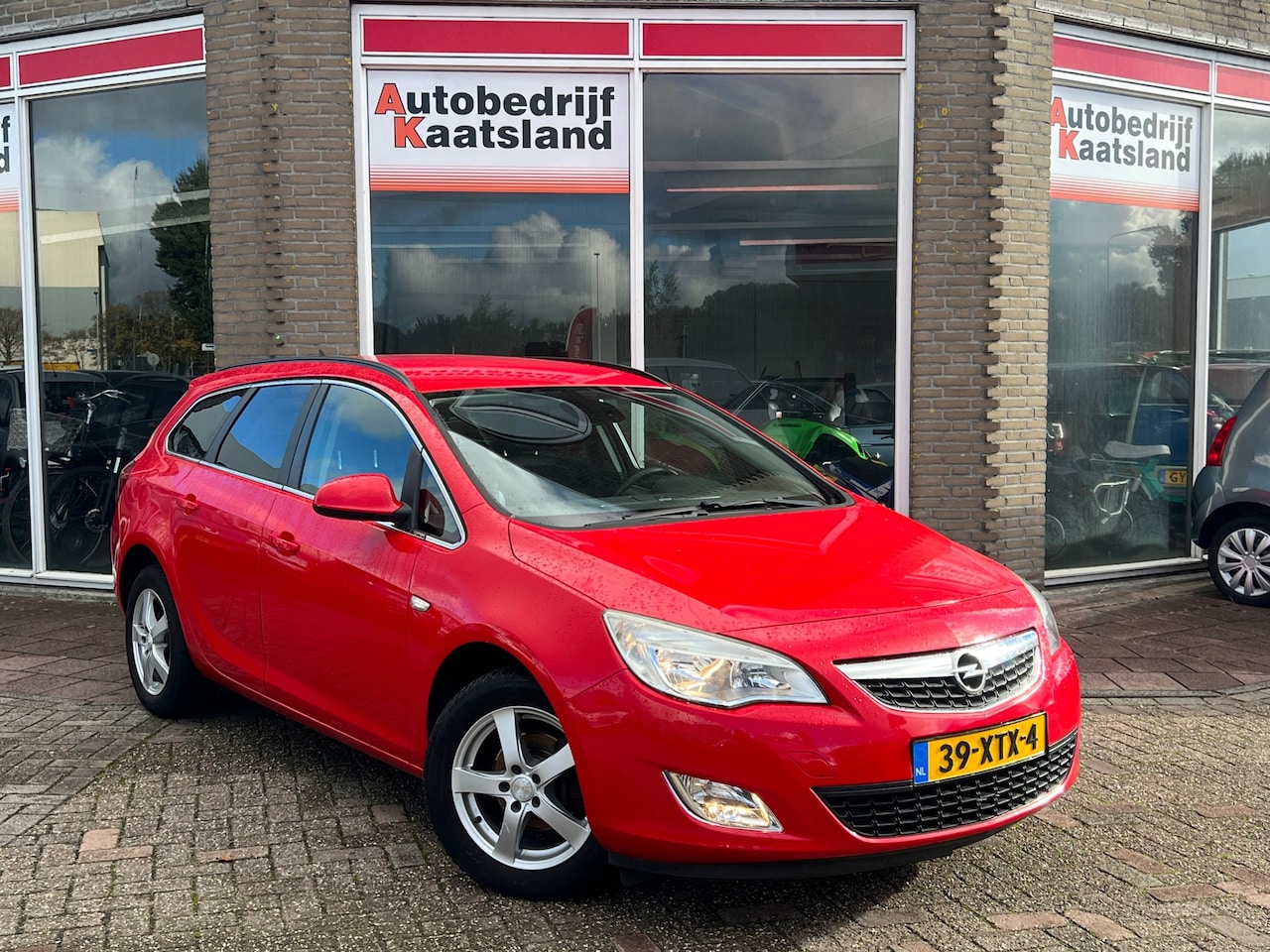 Opel Astra Sports Tourer - 1.4 Turbo Anniversary Edition 1.4 Turbo Anniversary Edition - AutoWereld.nl