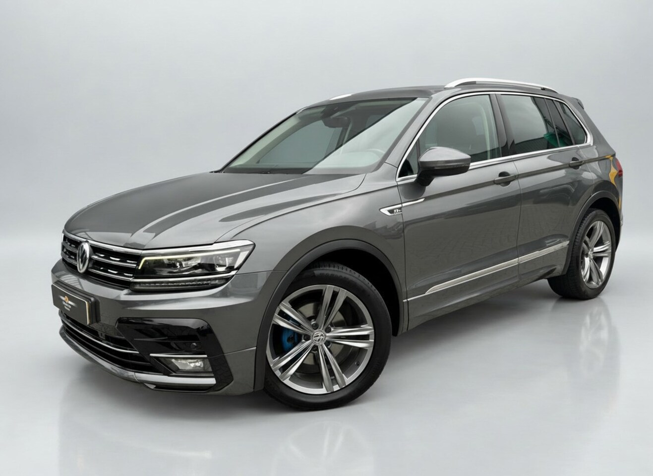 Volkswagen Tiguan - 1.4 TSI Automaat R-Line * Led Plus * Parkeeramera * Stoelverwarming * Adaptieve Cruise Con - AutoWereld.nl