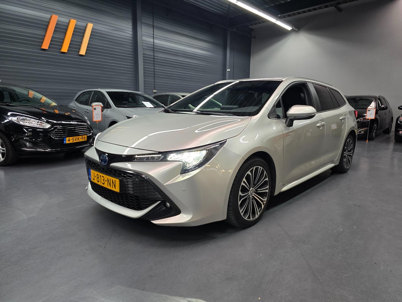 Toyota Corolla Touring Sports - 1.8 Hybrid Business Plus CAMERA LED DEALER ONDERHOUDEN - AutoWereld.nl