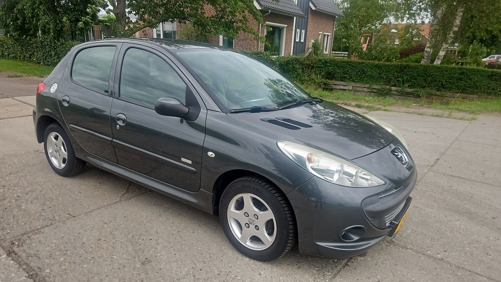 Peugeot 206 - 1.4 Millesim 200/ bj 2011/ airco/ 140.950 km - AutoWereld.nl
