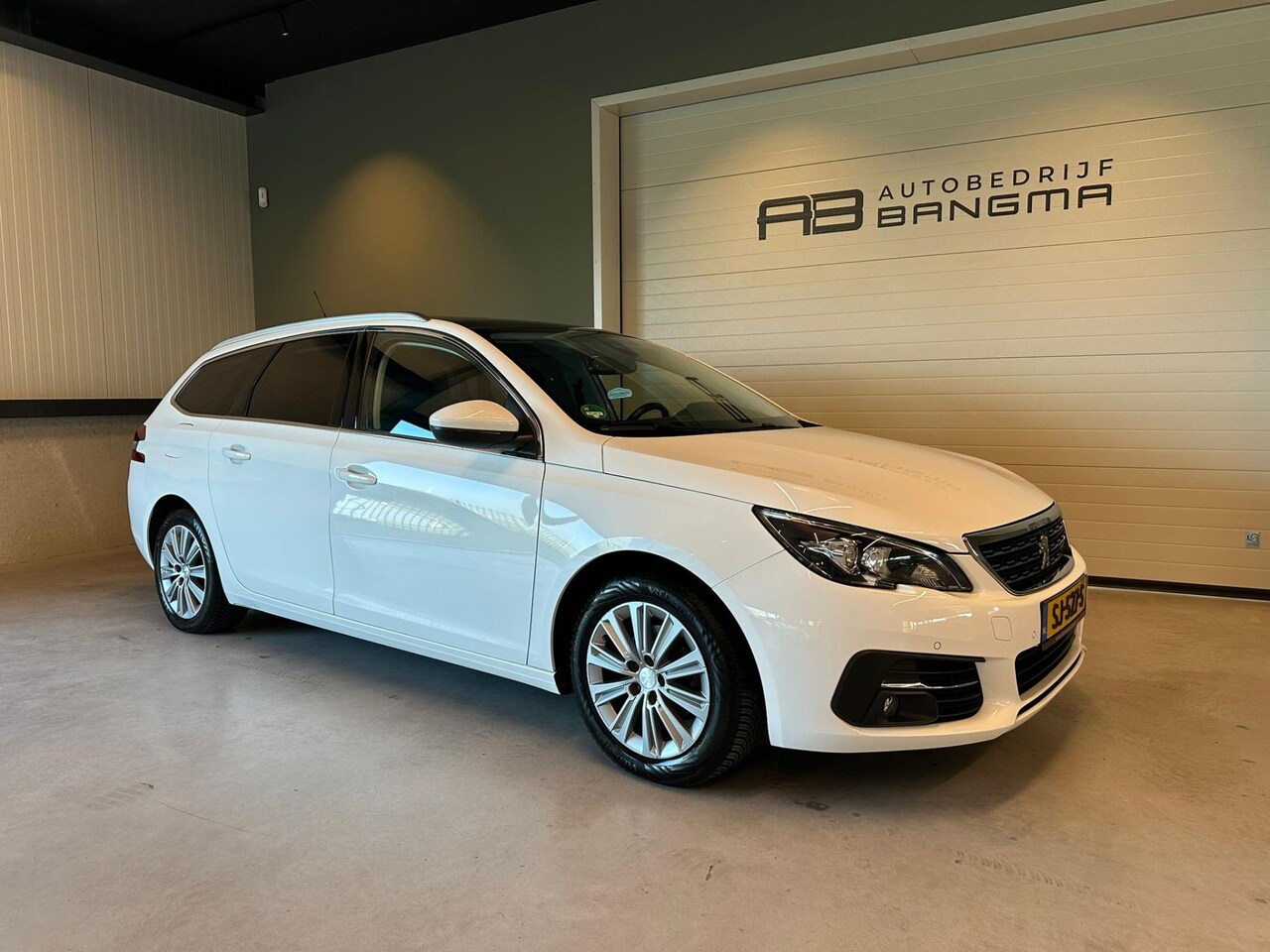 Peugeot 308 SW - 1.2 PureTech BLUE LEASE PREMIUM|NAVIGATIE|CLIMA AIRCO|ISOFIX|CRUISECONTROL|APPLE CARPLAY+A - AutoWereld.nl