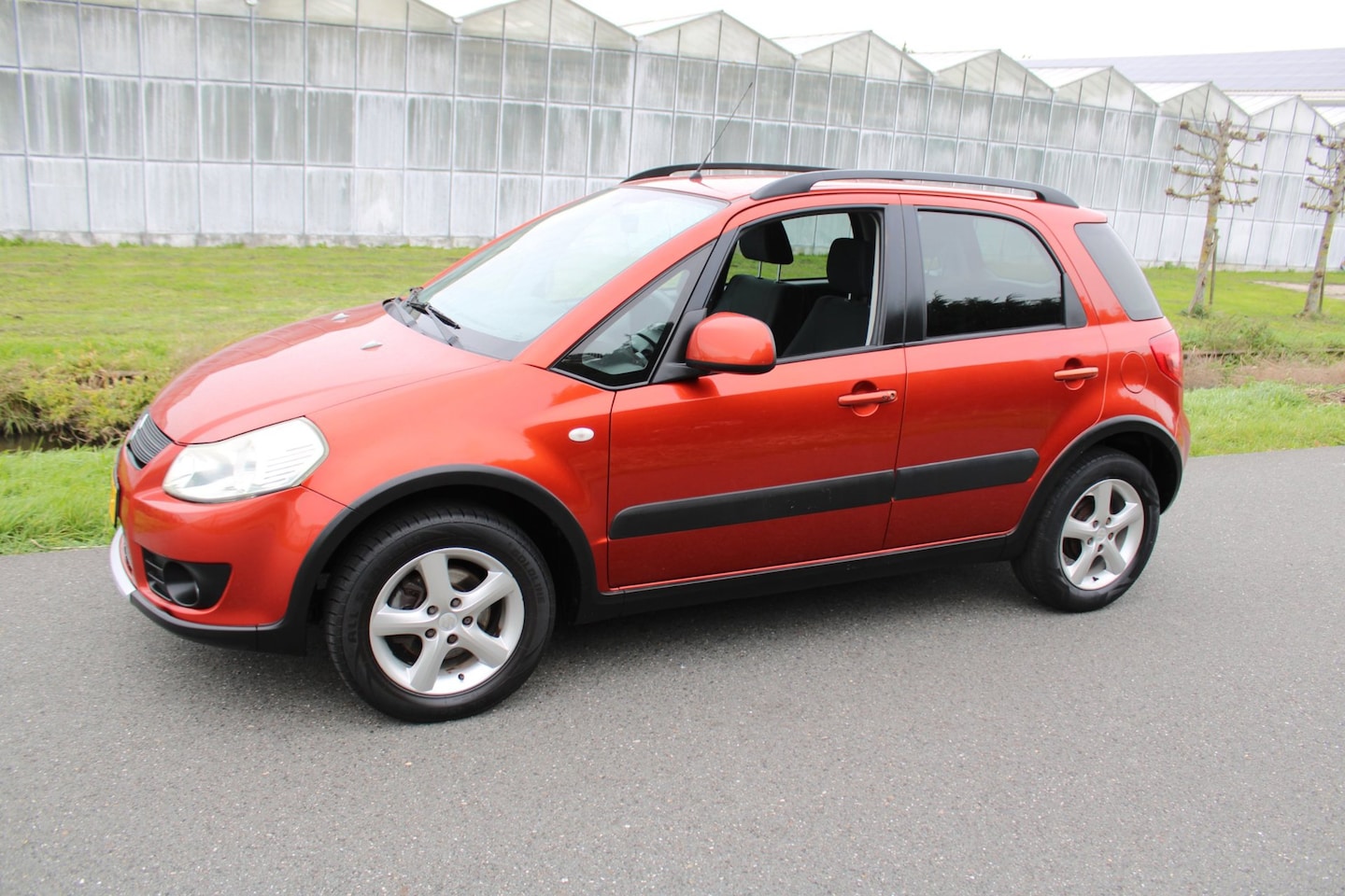 Suzuki SX4 - 1.6 4 Grip Exclusive 4X4 - AutoWereld.nl