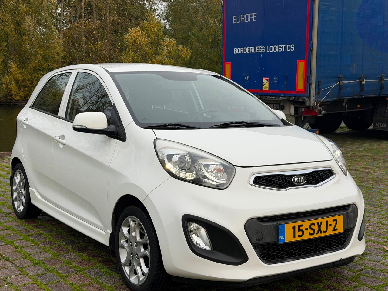 Kia Picanto - 1.2 CVVT Comfort Pack AUTOMAAT 2e eigenaar airco elektrische ramen - AutoWereld.nl