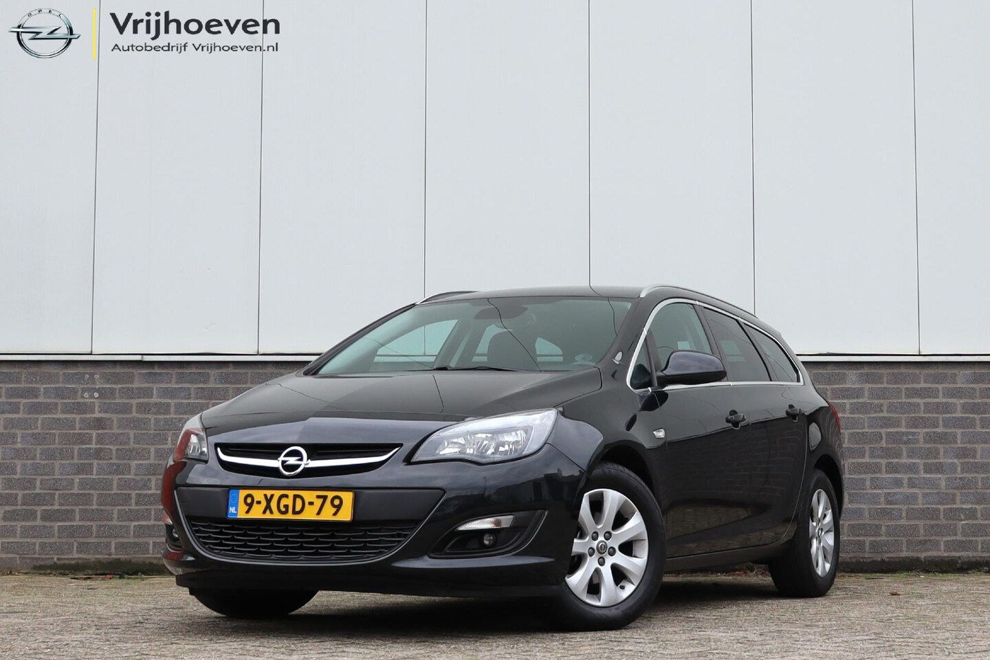 Opel Astra Sports Tourer - 1.4 Turbo Business + Trekhaak - AutoWereld.nl