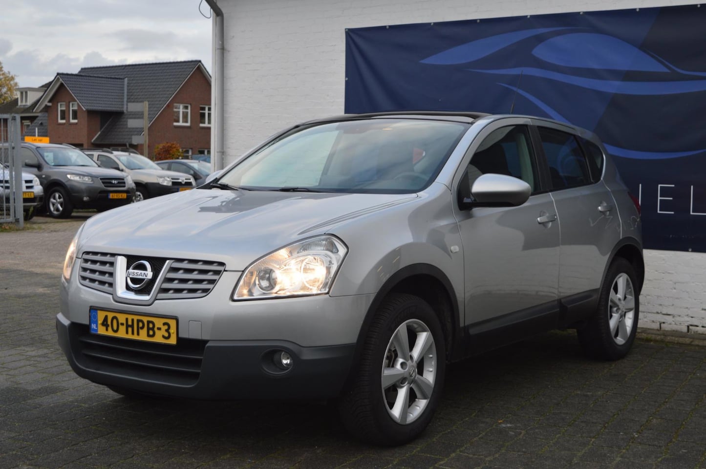 Nissan Qashqai - 2.0 Tekna / PANORAMADAK / AIRCO / NAVI / CRUISE CONTROL - AutoWereld.nl