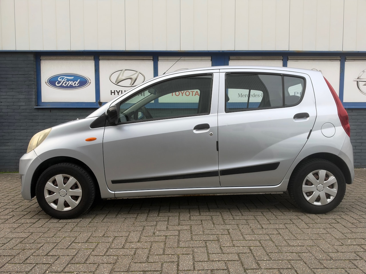 Daihatsu Cuore - 1.0 Trend 10-2008 NWE.APK 1750EU - AutoWereld.nl