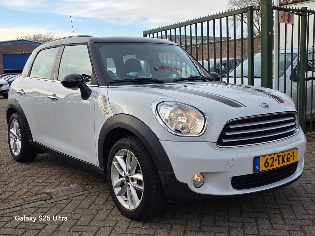 MINI Countryman - Mini 1.6 Cooper Business Line Zeer netjes dealer onderhouden airco cruis control parkeer s - AutoWereld.nl