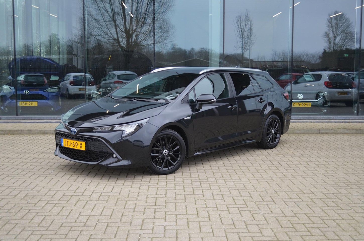 Toyota Corolla Touring Sports - 1.8 Hybrid Dynamic | Trekhaak | Keyless | Stoel & stuurverwarming - AutoWereld.nl