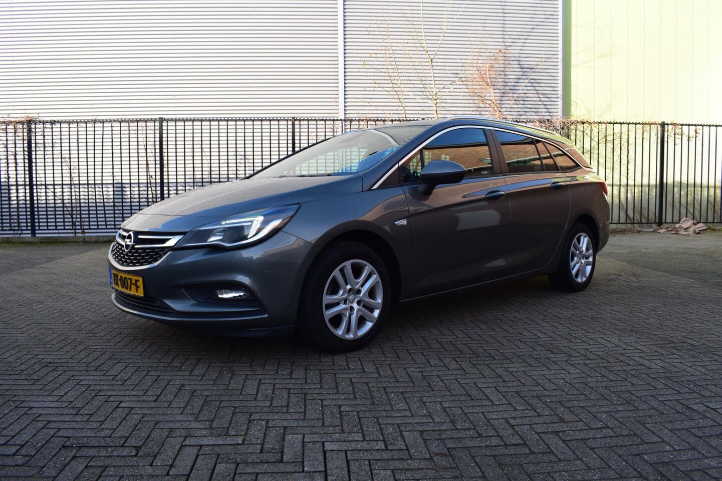 Opel Astra Sports Tourer - 1.0 Turbo 12 mnd GARANTIE DealerOH Carplay Navi CruisC Climate - AutoWereld.nl