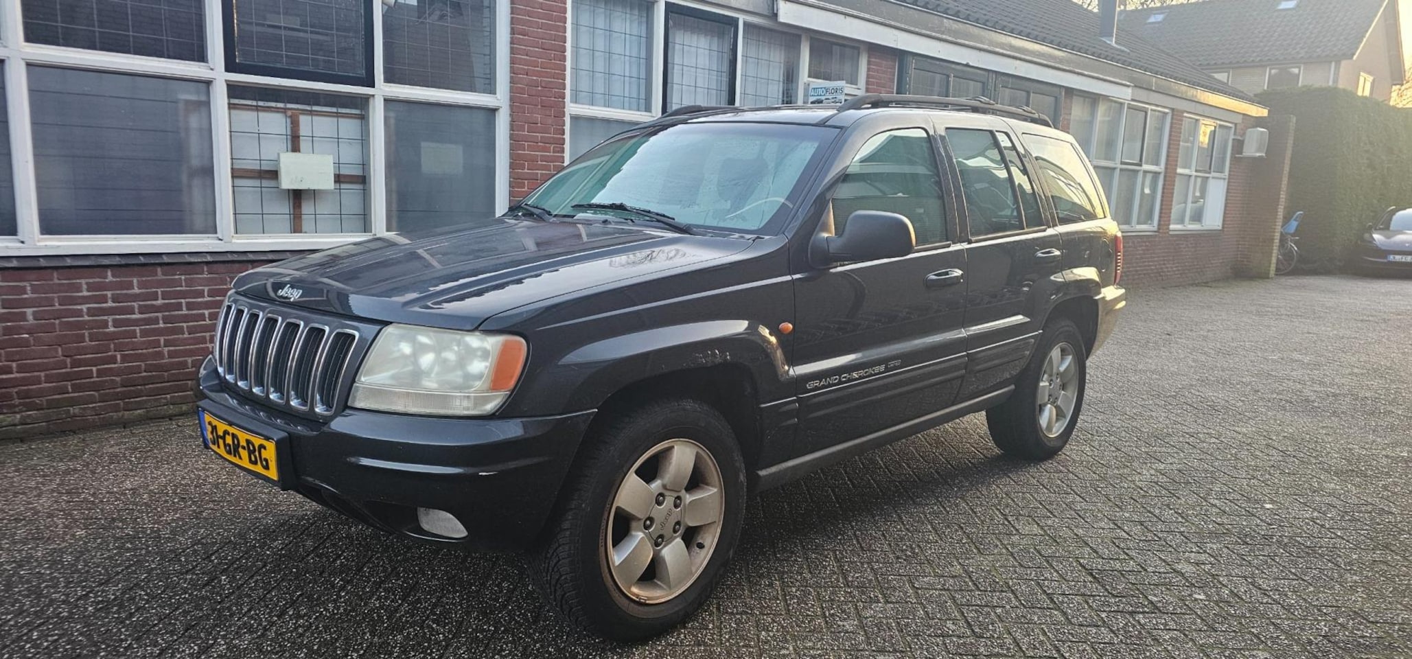 Jeep Grand Cherokee - 4.7i V8 Limited 4.7i V8 Limited - AutoWereld.nl