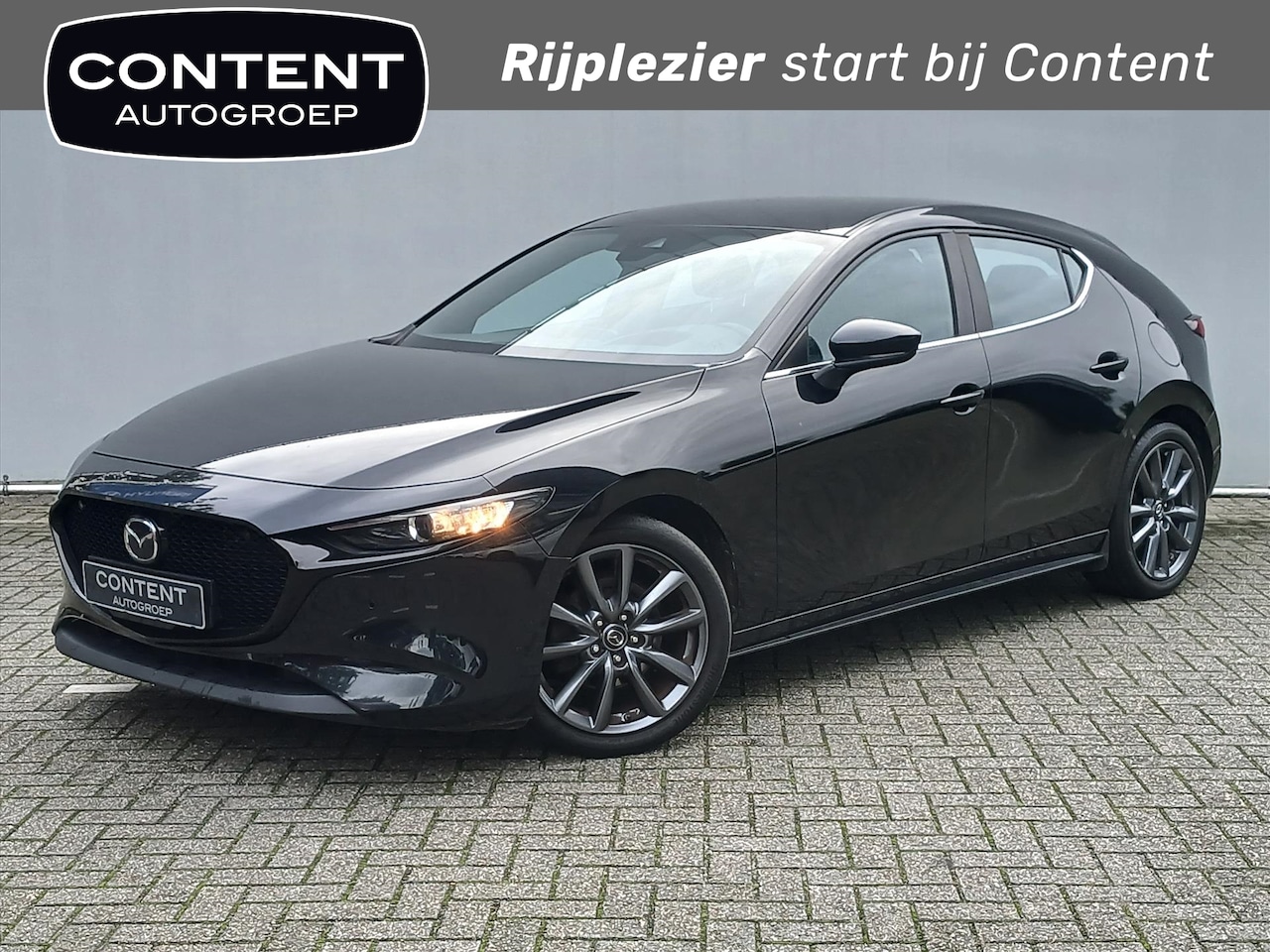 Mazda 3 - e-SkyActiv-G M Hybrid Comfort + Trekhaak / HUD / Add. Cruise / Navigatie + Camera! / Stoel - AutoWereld.nl