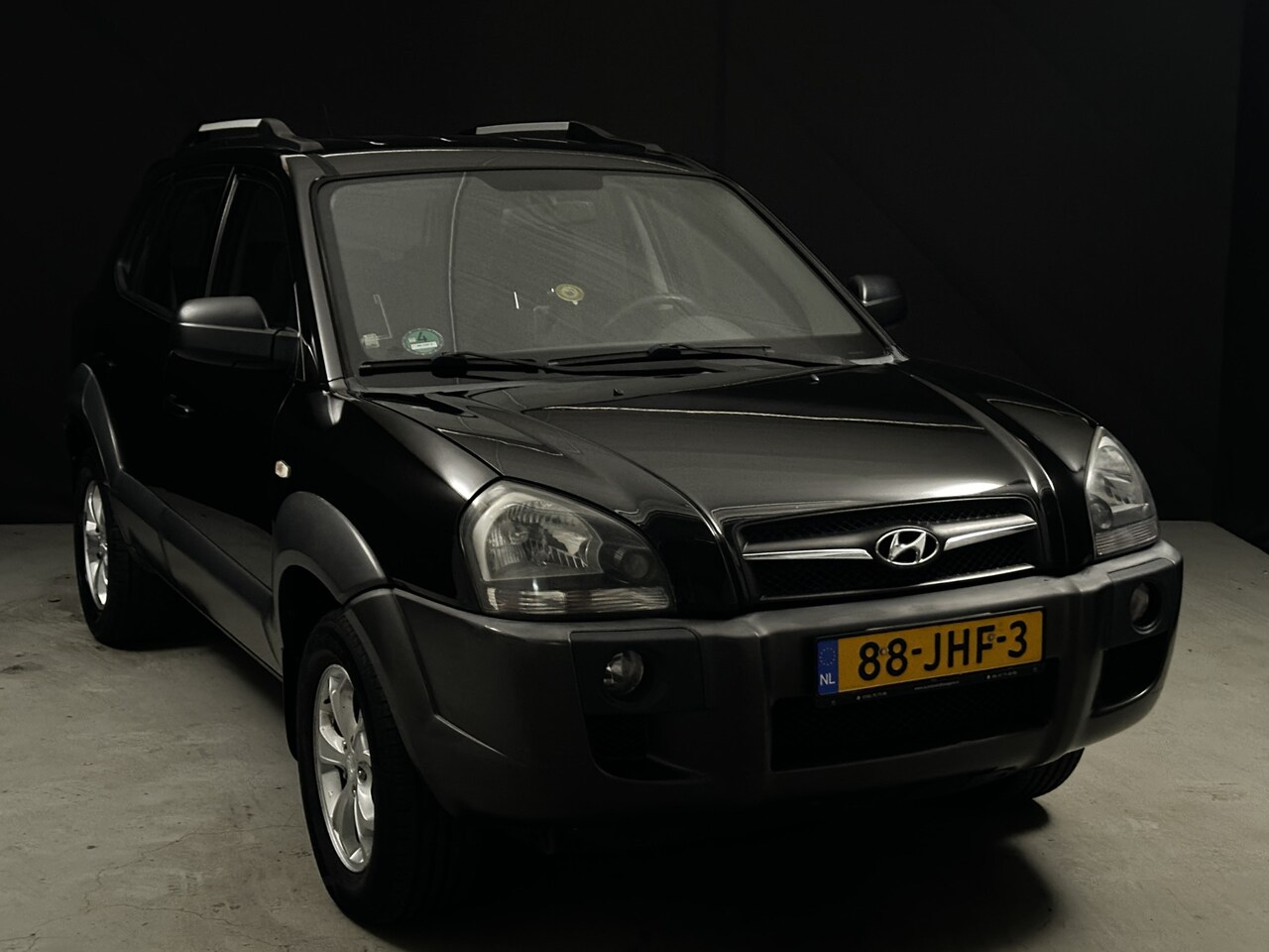 Hyundai Tucson - 2.0i Active *AC* - AutoWereld.nl